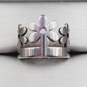 Silver Tone Daisy Cutout Band — Playful Elegance & Modern Shine